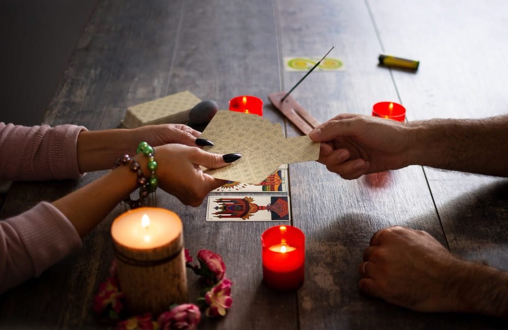 fortune-teller-reading-future-by-tarot-cards-rustic-table